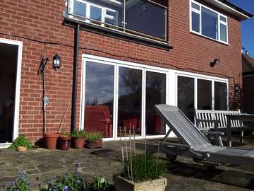 NANTWICH CHESHIRE ; Installation of FSD Aluminium Bi Fold Doors. Triple Glazed - U Value 1.. Std Ral Aluminium folding sliding doors Cheshire near Manchester